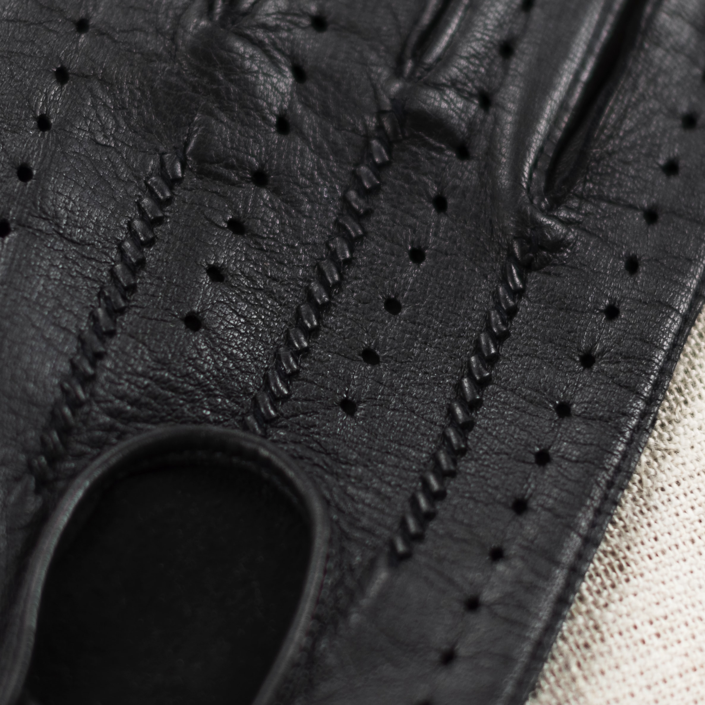 Engelmuller black leather driving gloves crossed